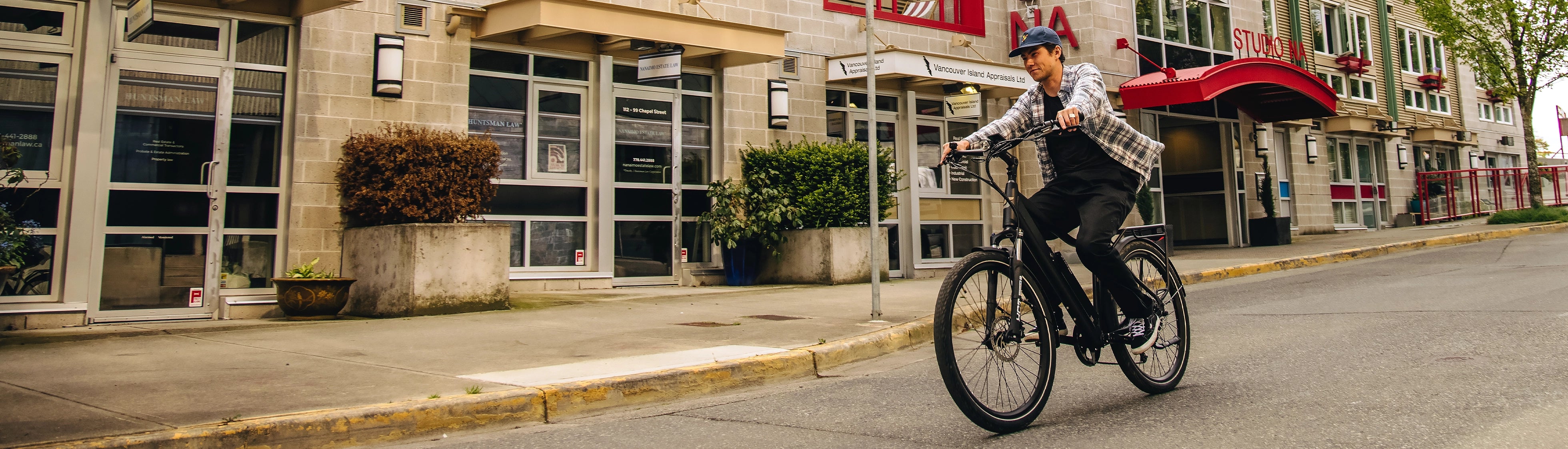 Person riding eBike on street