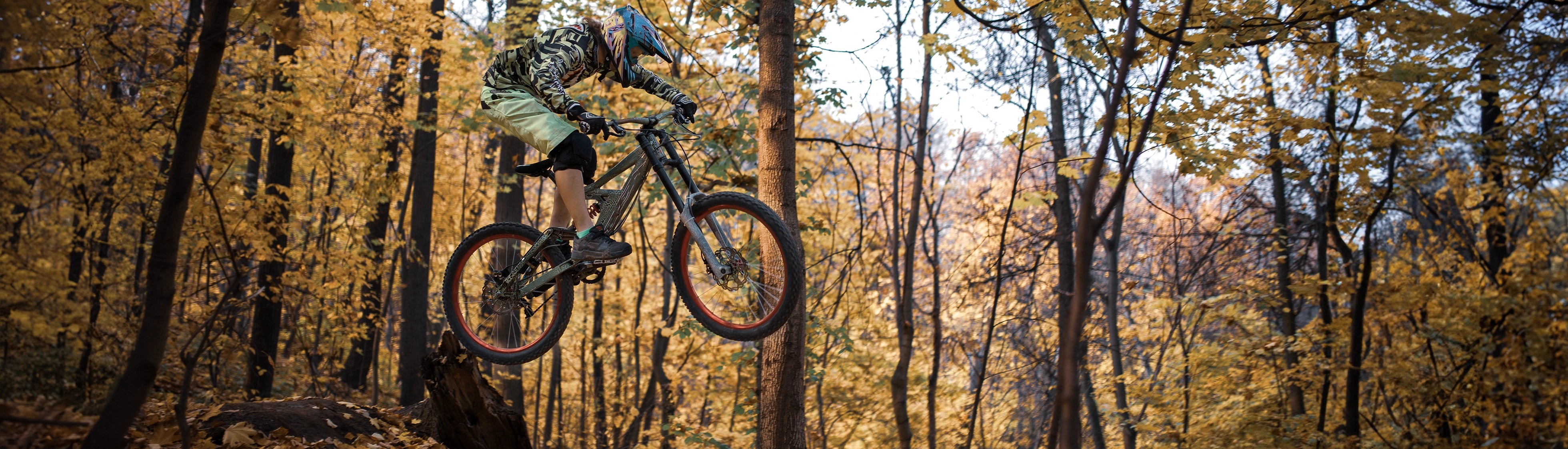 Person riding S604 eBike on mountain trail 